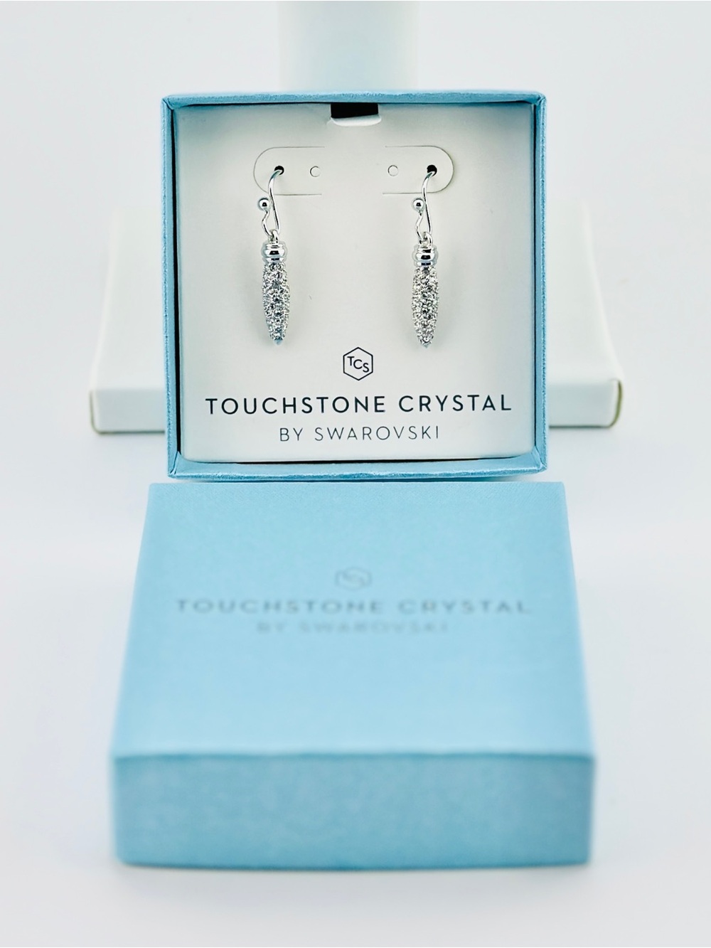 SPIKED EARRINGS
Touchstone Crystal by Swarovski Light Blue